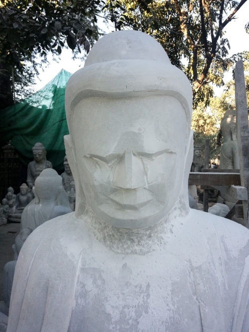 An unfinished Buddha in the Mandalay area where they make them.