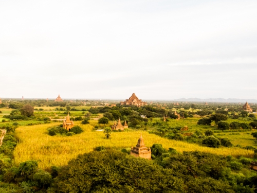 In Bagan, the stupas and pagodas are spread across the landscape as far as the eye can see.