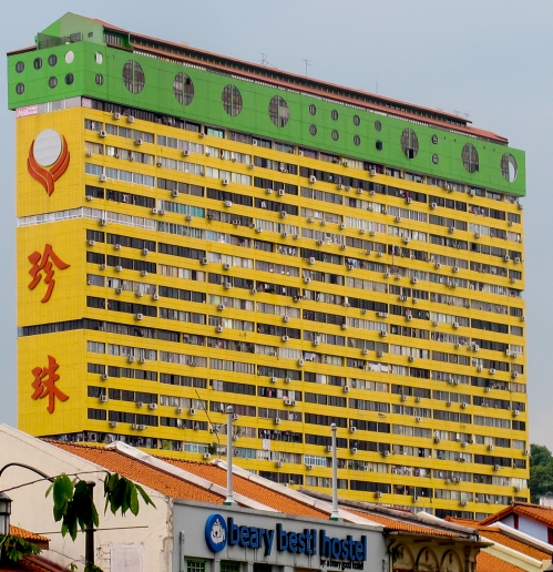 A cool apartment block in Chinatown, Singapore - more air conditioning than you can shake a twizzle stick at. An unimaginable place to live 50 years ago. 